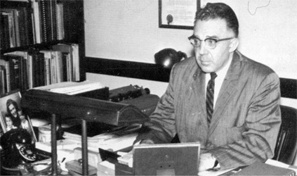 Photo of Dr. Janse at desk