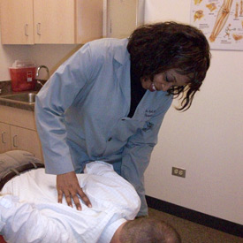 doctor miller adjusting patient