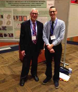 Student Matthew Budavich, DC and Gregory Cramer, DC, PhD, dean of the department of research