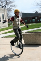 carl vigilante riding unicycle