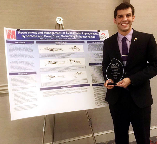 NUHS student Addison Ozakyolwin winning Thomas Hyde Research Poster competition