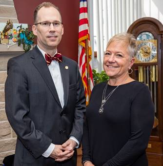 Dr. Joseph Stiefel, NUHS President and alumna Dr. Kristin Grace