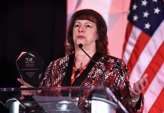 Karen Konarski winning humanitarian of the year award