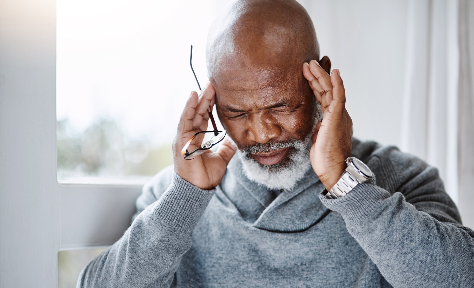 African-American male suffering a headache