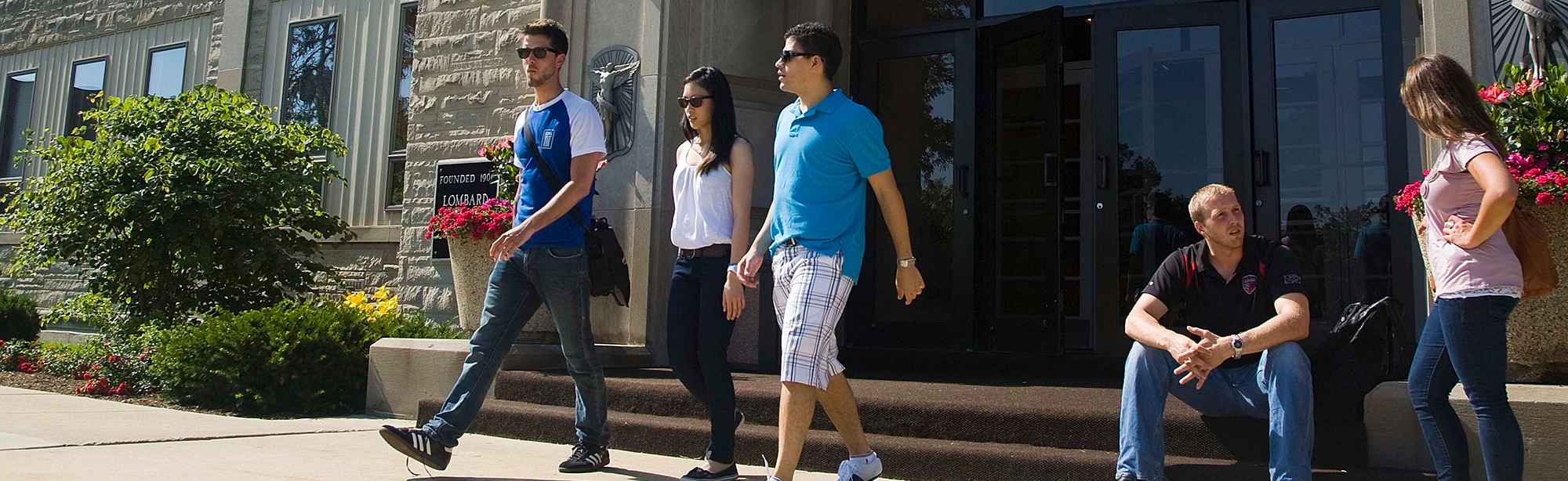students walking around campus during orientation