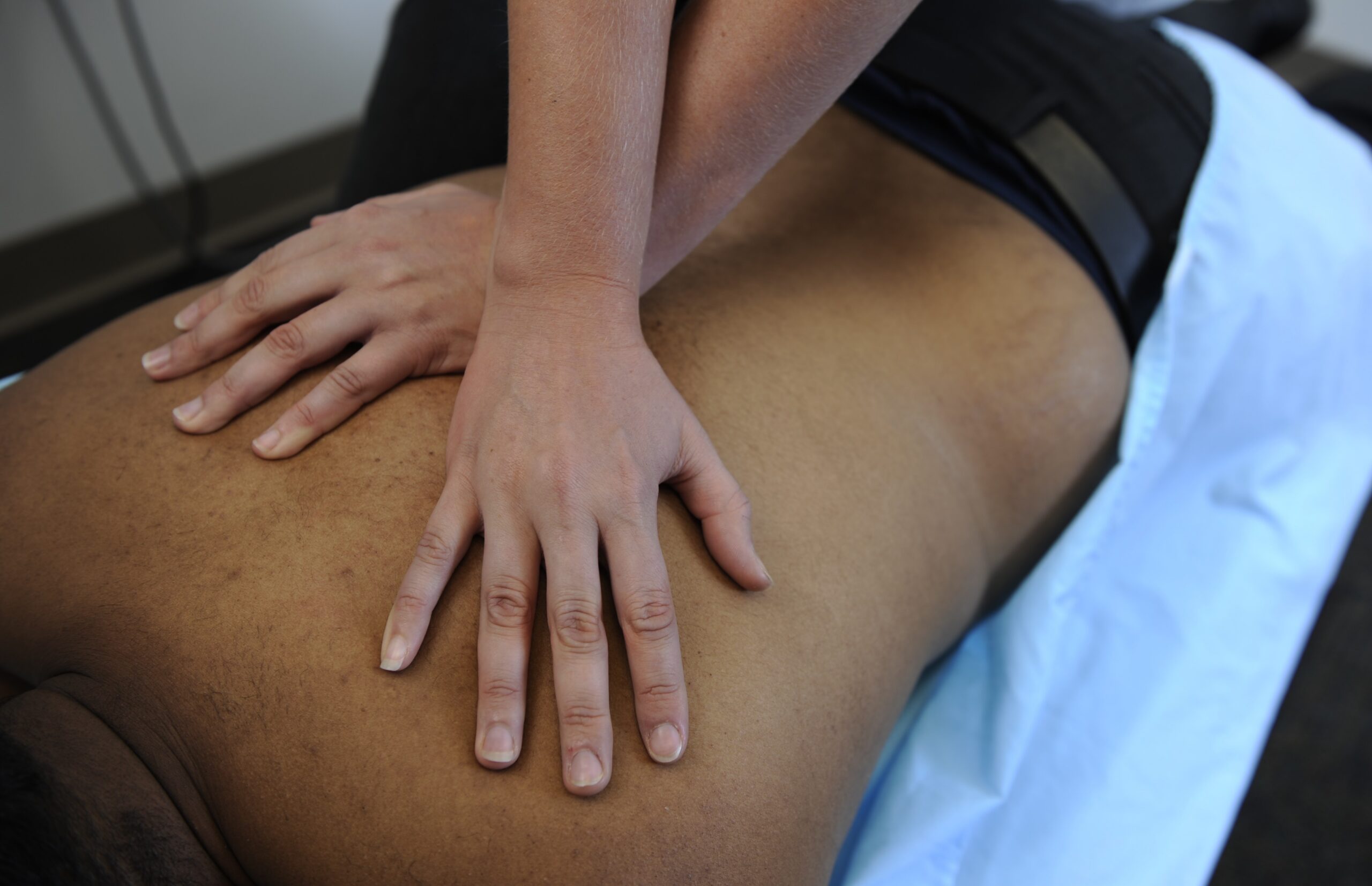 DC intern adjusting male patient