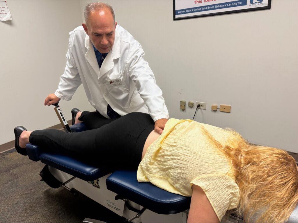 Dr. Serlin adjusts patient
