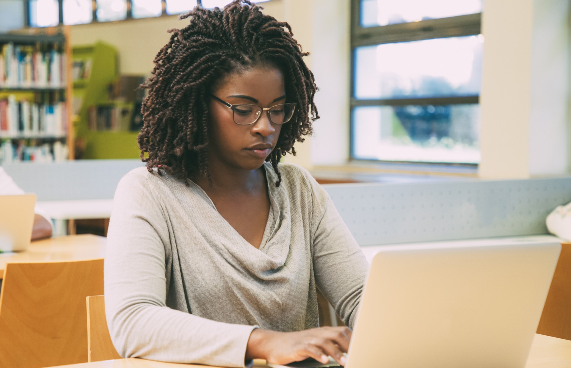 Female student taking digital exam