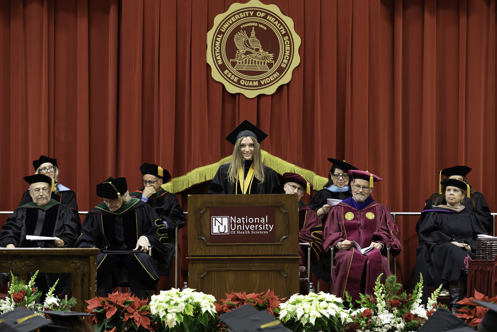 Valedictorian gives her speech during Fall 2025 graduation ceremony