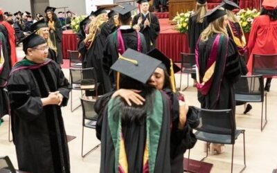 National University celebrates new graduates and longtime faculty member Dr. Elder during commencement ceremony