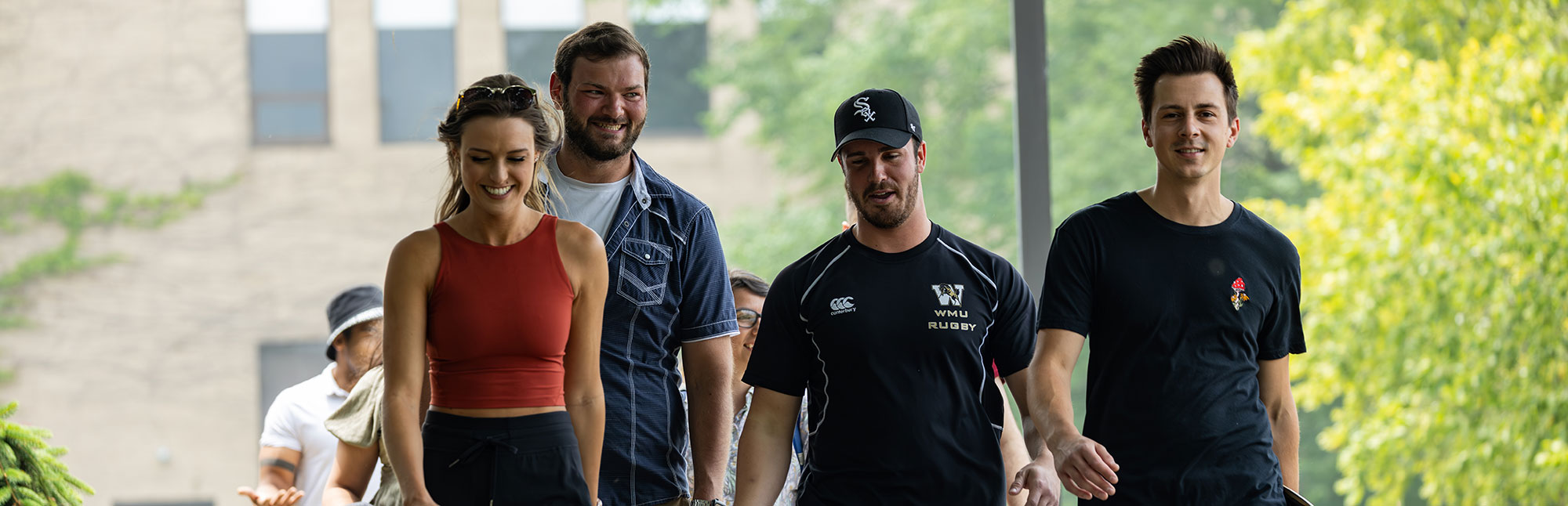 students walking outside at NUHS campus