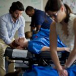 NUHS students working in a practical chiropractic lab