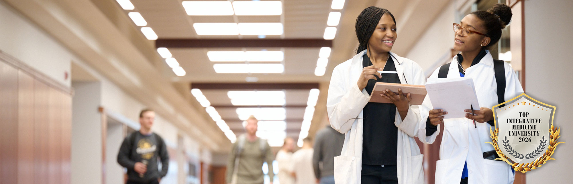 students walking in janse hallway