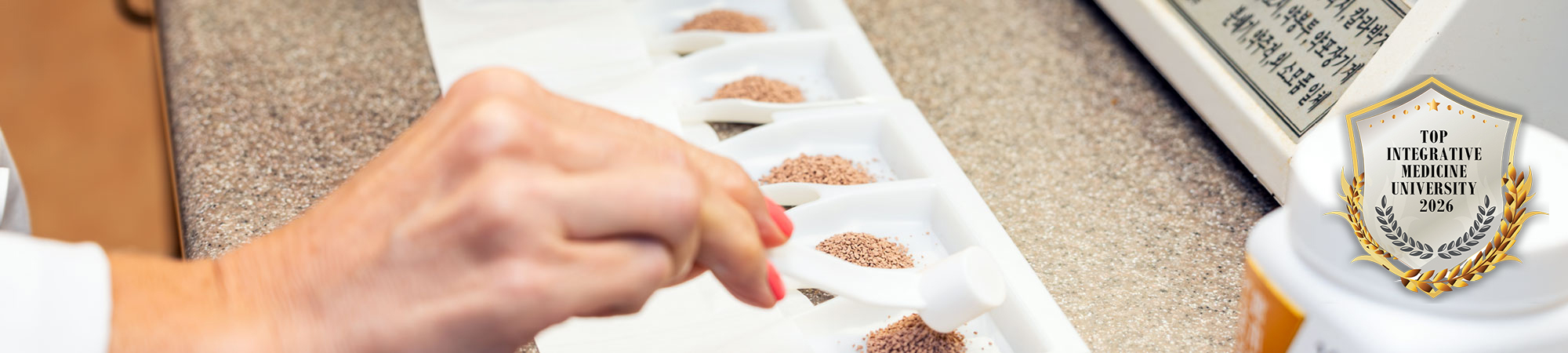 mac student working with herbal medicine