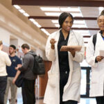 students walking in janse hallway